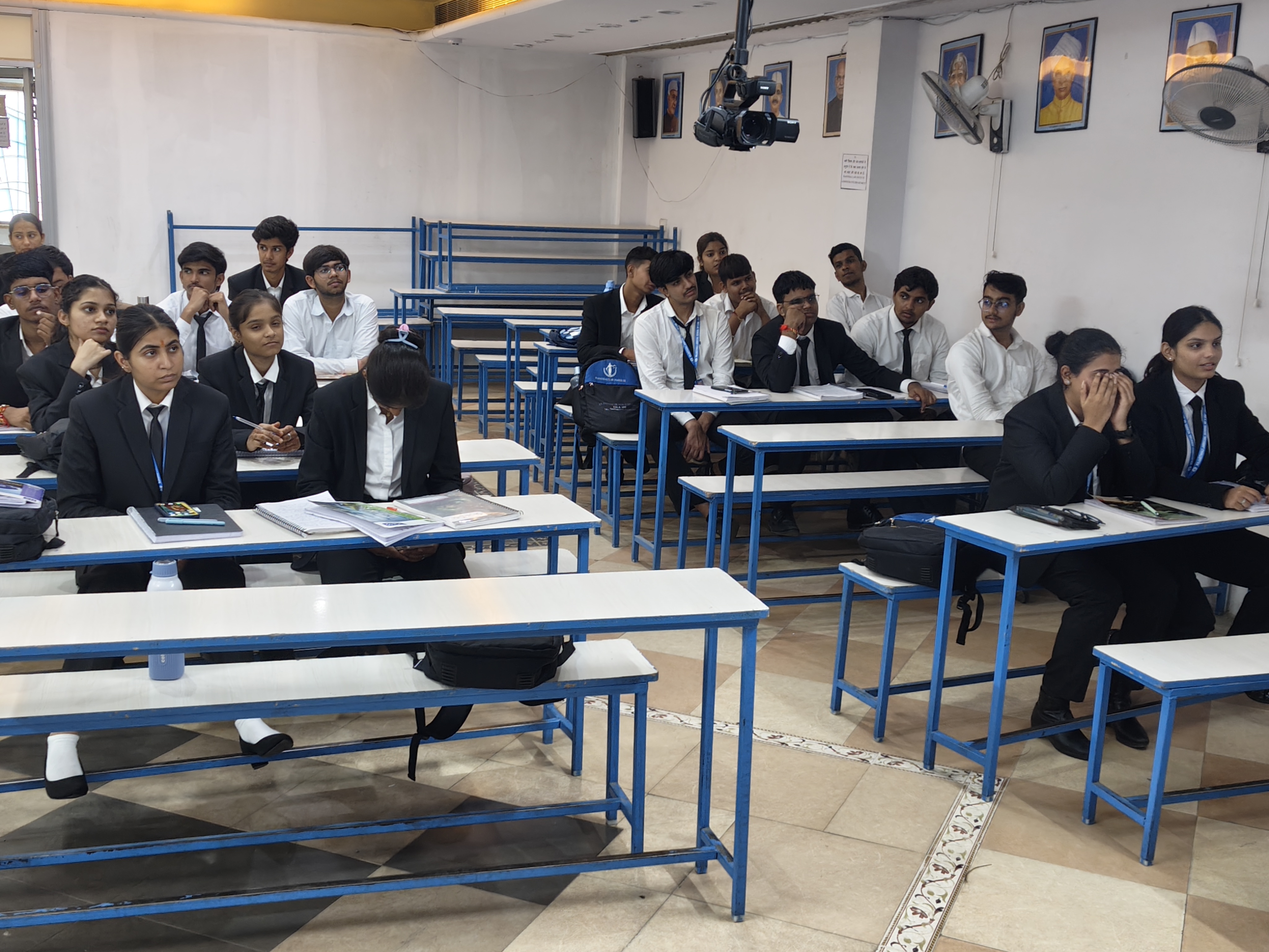 Step into a classroom buzzing with ambition and focused ener