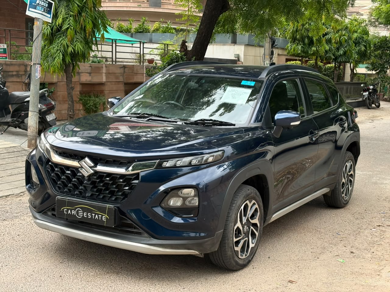 * 🚘 *Maruti Fronx Alpha Turbo S. Hybrid* 
* ⛽ *Petrol*
* 